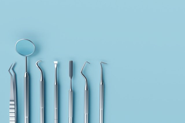 Dental Tools with a blue background
